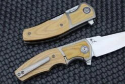 Reate Knives Mini Crossroads W/ White Micarta Inlays & M390 -Nc Blade image 1973bf9d f823 4324 8c4b 32e53135982d