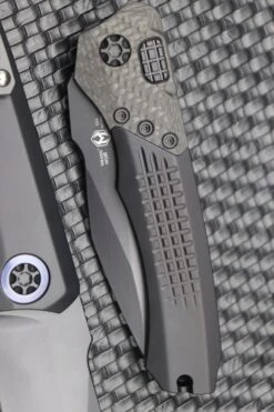 Heretic Knives Wraith Auto Black Drop Point W/ Carbon Fiber Bolster & Black Handle W/ Blue Pivot Collar H000-4A-T -Nc Blade image 3bdb8965 87b9 4caa afee 6e22dcae96b4