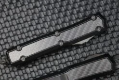 Microtech Makora Shadow DLC D/E Full Serrated W/ DLC Hardware Nickel Boron Internals & Carbon Fiber Inlays 206-3DLCTCFISH -Nc Blade image 57ddbeda e58f 4297 9b4c f01817f851d8