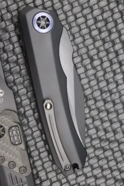 Heretic Knives Wraith Auto Black Drop Point W/ Carbon Fiber Bolster & Black Handle W/ Blue Pivot Collar H000-4A-T -Nc Blade image 95ef2222 1694 49b7 9641 e5af08d12312