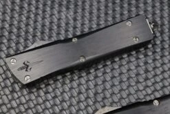 Marfione Custom Knives Combat Troodon D/E Vegas Forge Hot Blued Sharktooth Pattern Blade/Clip W/ Hefted Black Handle & DLC Ringed Hardware -Nc Blade image ce076306 0cd0 44b5 878f c20abd682a92