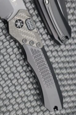 Heretic Knives Wraith Auto Black Drop Point W/ Carbon Fiber Bolster & Black Handle W/ Blue Pivot Collar H000-4A-T -Nc Blade image ebd96a1f ecae 4bfe 8e71 7b16b37b9ec2